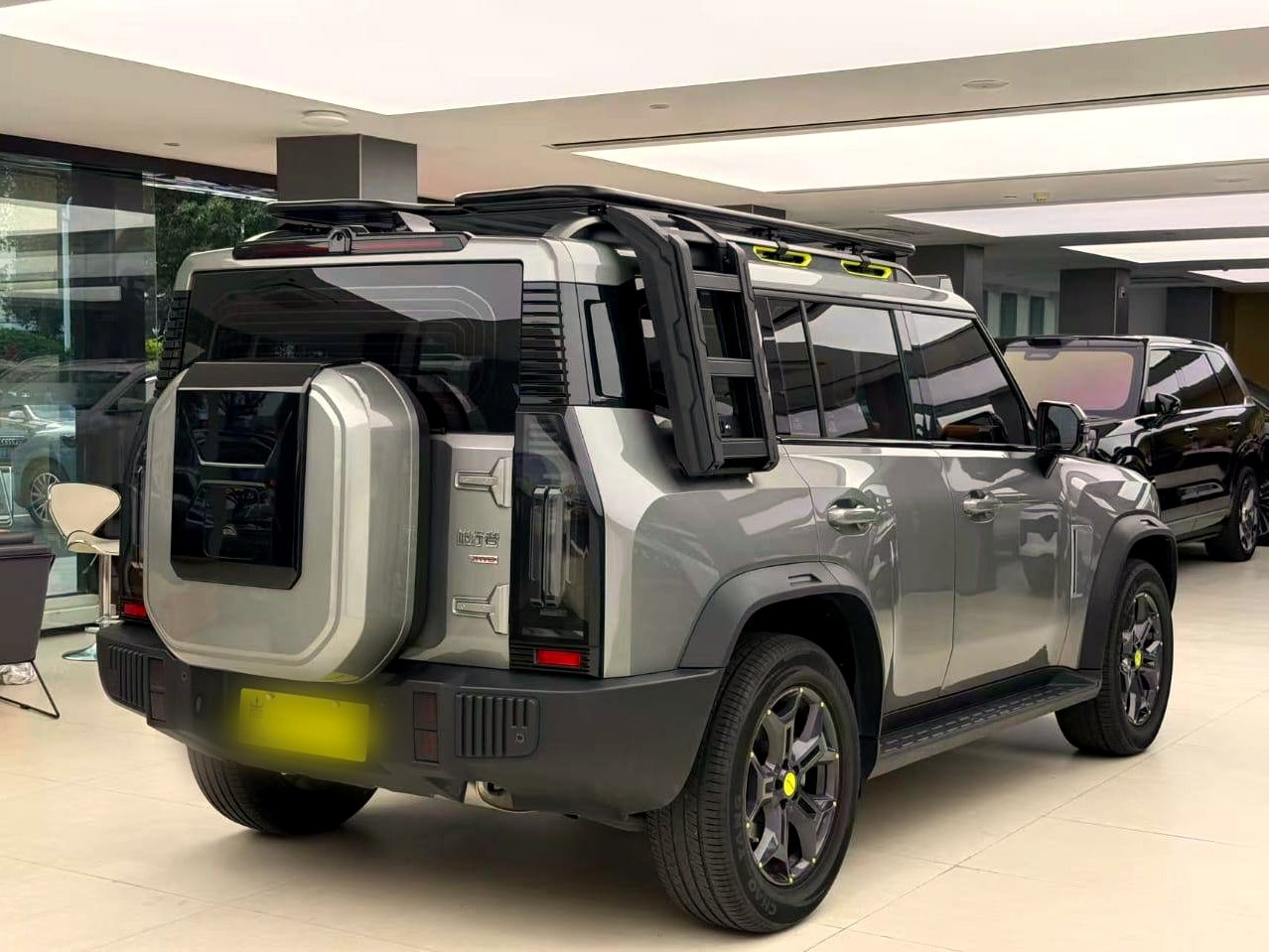 Jetour T2 rear three-quarter in showroom